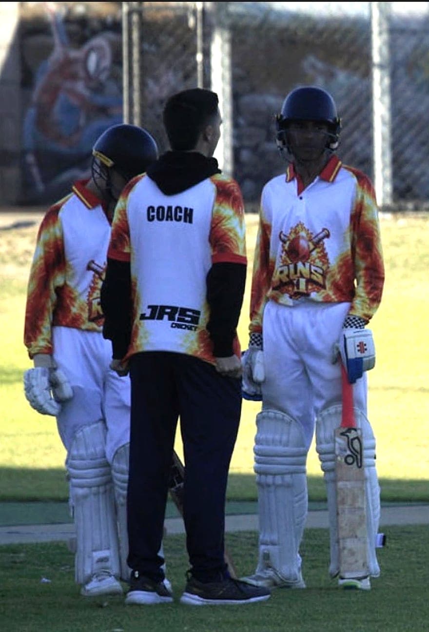Koby coaching two RUNS XI batters mid-match